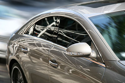 image of car driving through Michigan